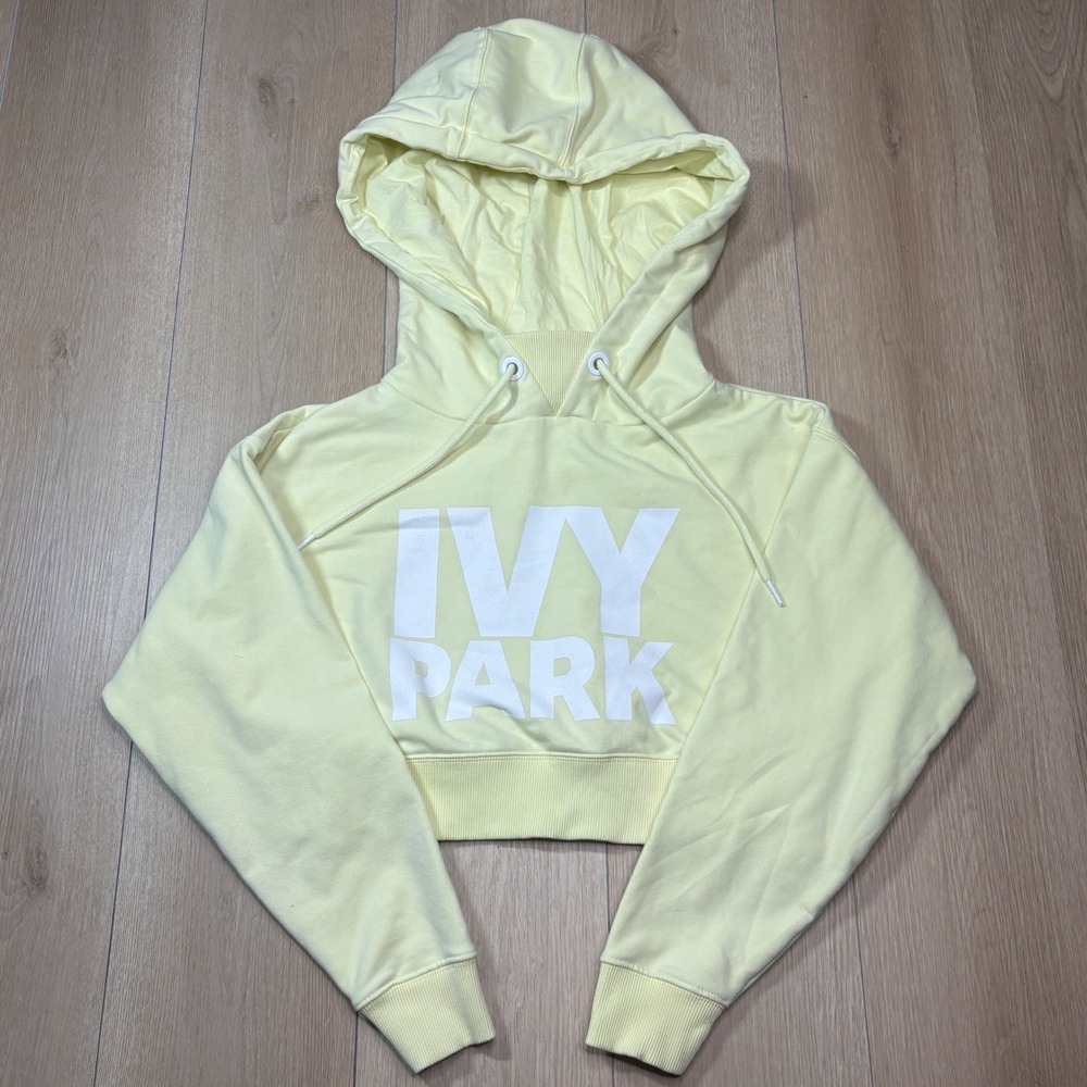 Ivy Park Beyoncé Womens XS Cropped Hoodie Pale Yellow Logo Graphic Sweatshirt